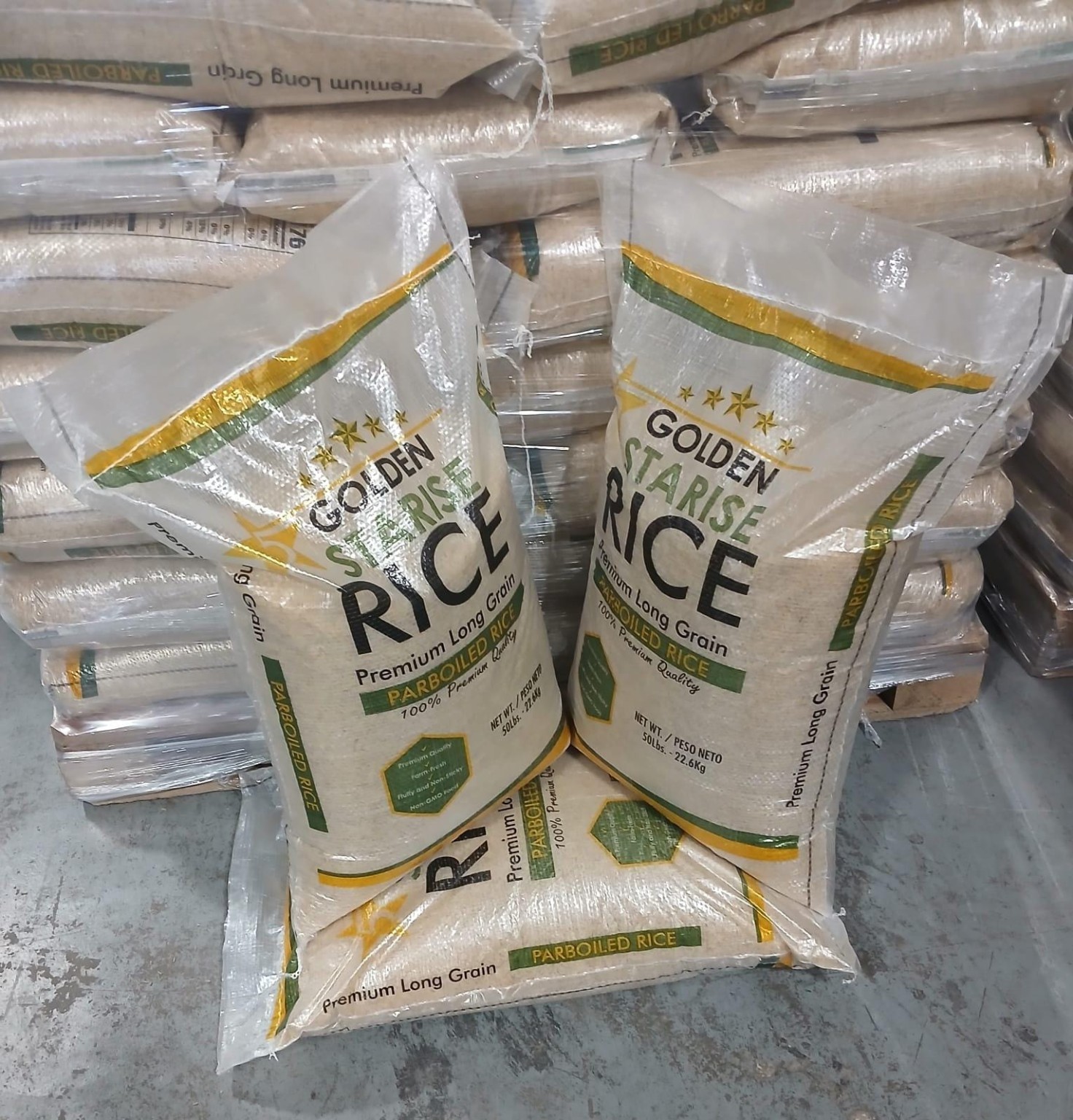 Golden Starise rice bags photographed with stacked packs